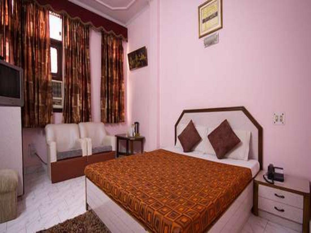 Hotel Woodland Deluxe Nové Dillí Pokoj fotografie